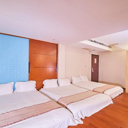 Tian Long Hotel Csiaohszi Kültér fotó