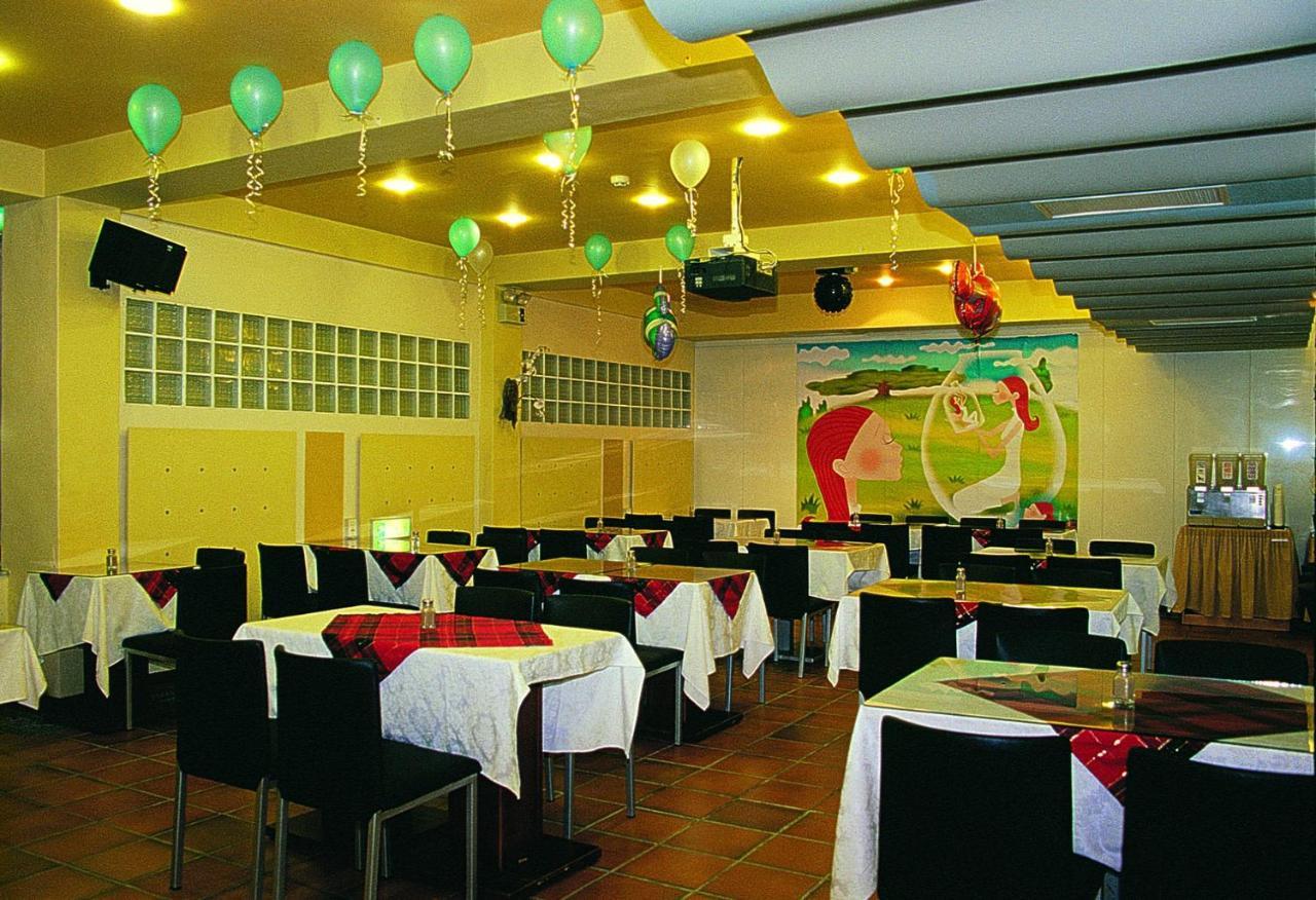 Tian Long Hotel Csiaohszi Kültér fotó