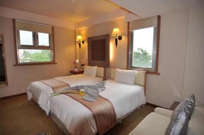Tian Long Hotel Csiaohszi Kültér fotó