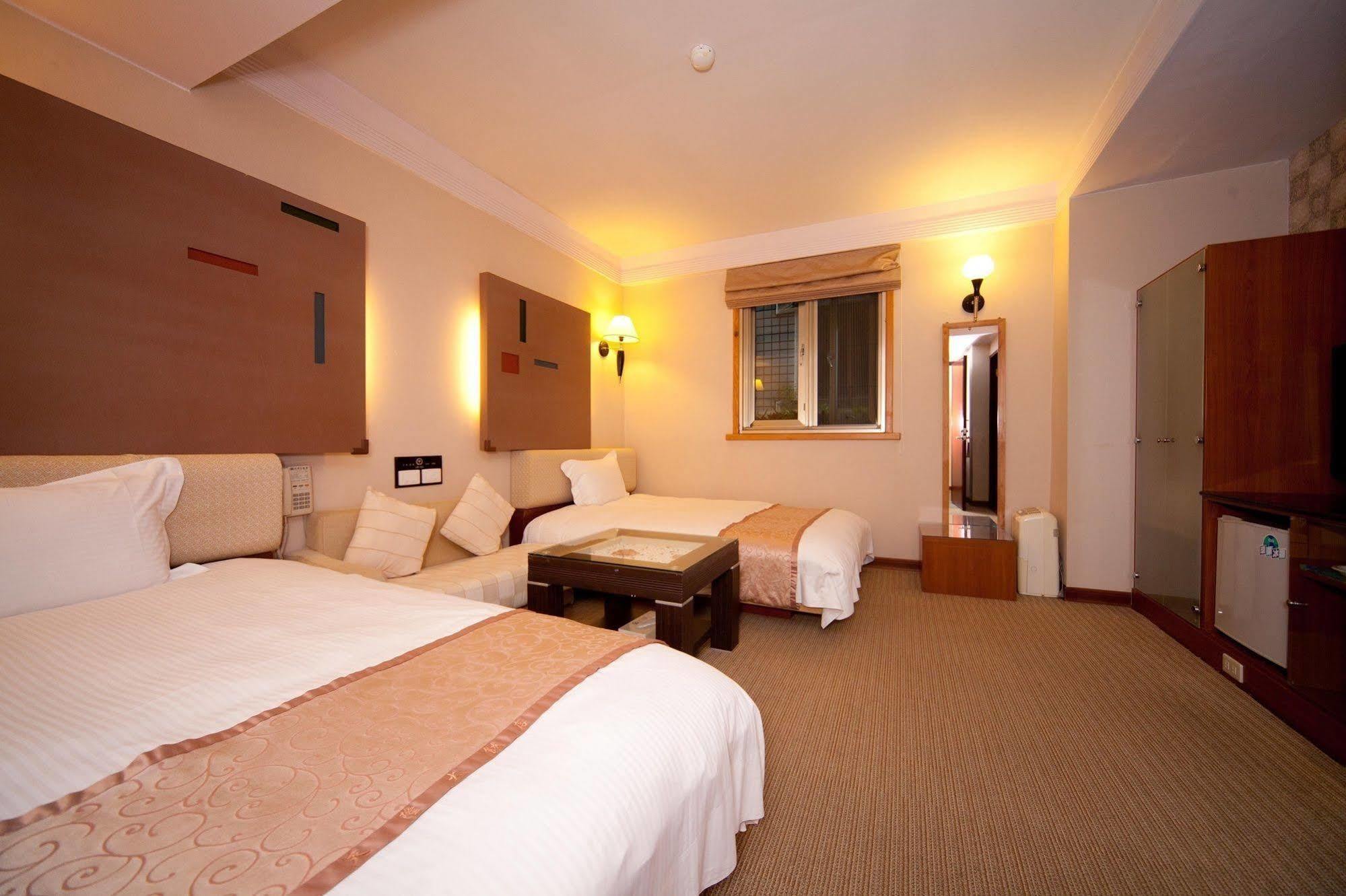 Tian Long Hotel Csiaohszi Kültér fotó