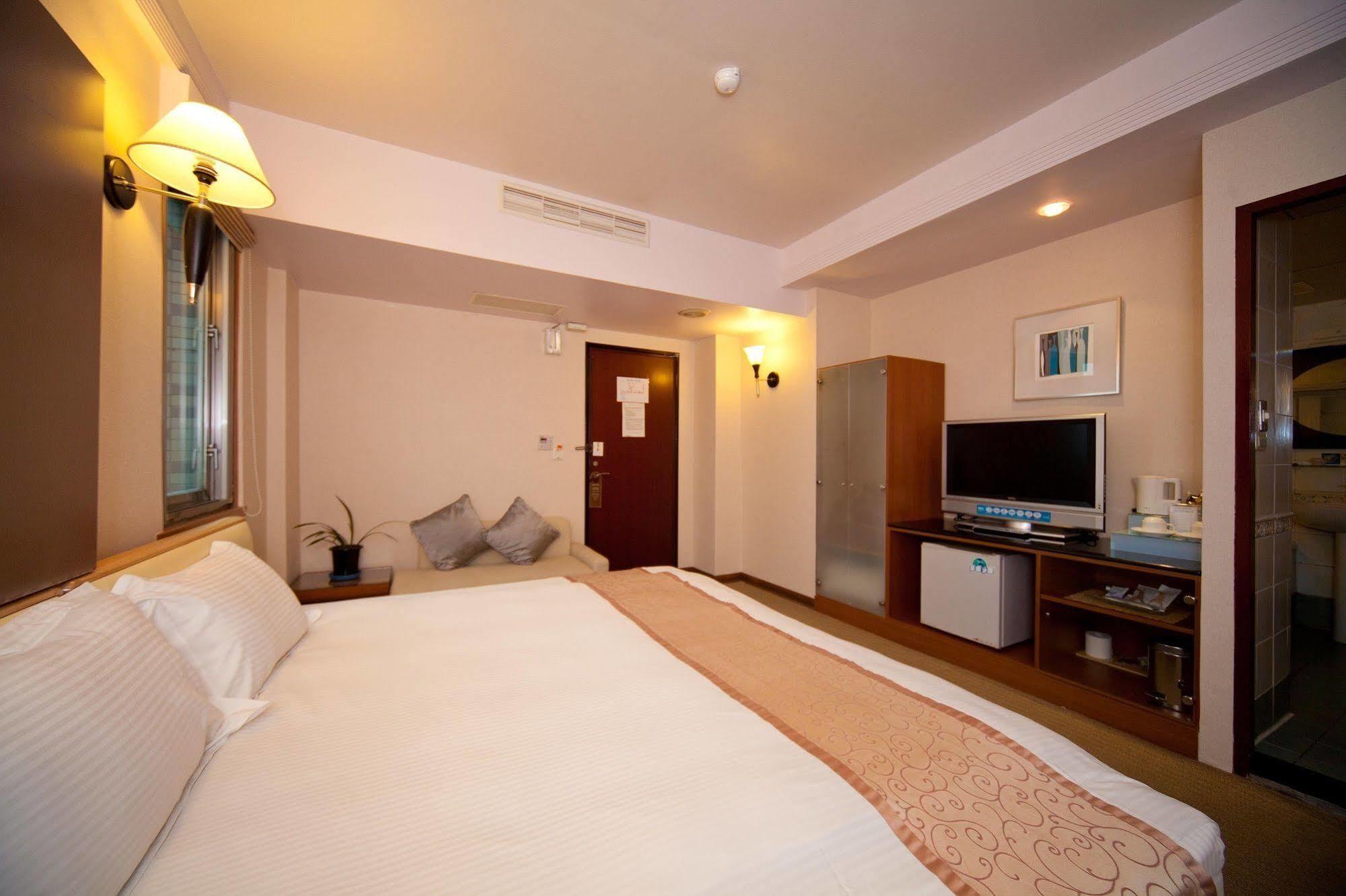Tian Long Hotel Csiaohszi Kültér fotó