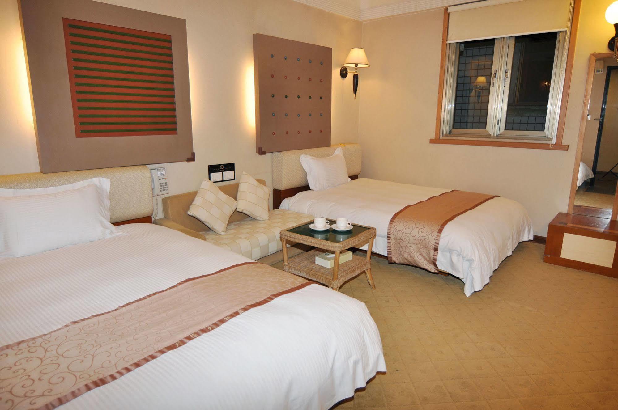 Tian Long Hotel Csiaohszi Kültér fotó