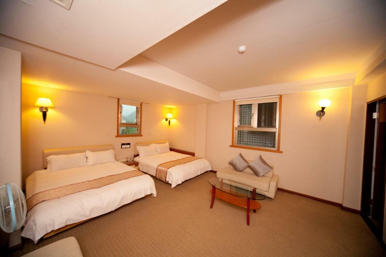 Tian Long Hotel Csiaohszi Kültér fotó