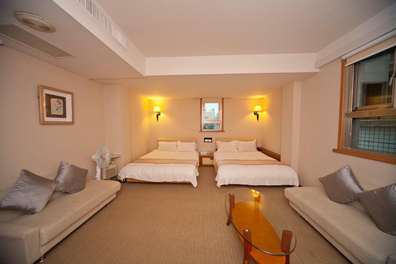 Tian Long Hotel Csiaohszi Kültér fotó